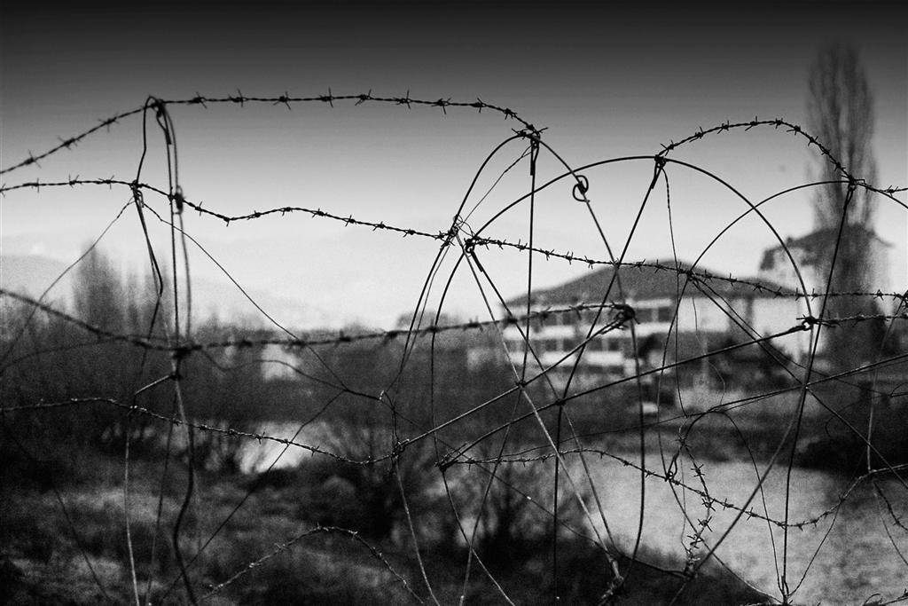 Barbed wire separates the Serbian and Albanian territory in Kosovska Mitrovica