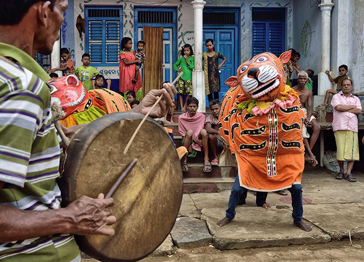 tiger dancer with drummer