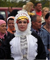 Young Gorani woman in traditional costumes.