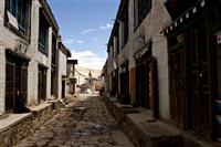 One of the main streets in the village of Lo Manthang, in a place where over 700 residents live inside and outside of the walls of Lo Manthang, Upper Mustang